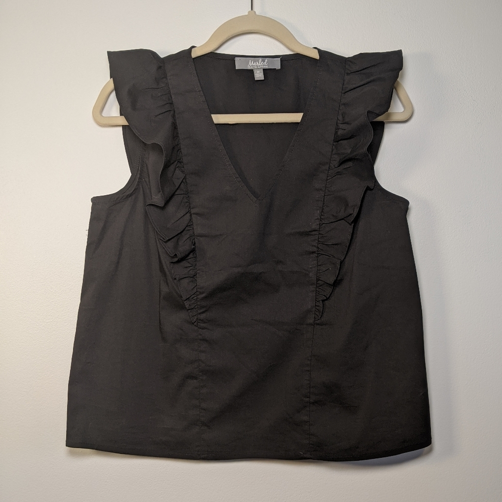 Black sleeveless ruffled blouse